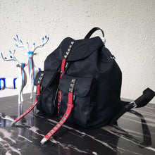 Load image into Gallery viewer, Prada Black Nylon Backpack With Red Metal Studs