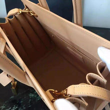 Load image into Gallery viewer, Yves Saint Laurent Baby Sac De Jour Bag In Beige Leather