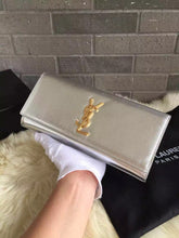 Load image into Gallery viewer, Yves Saint Laurent Silver Classic Metallic Monogramme Clutch