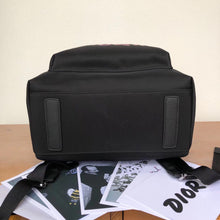 Load image into Gallery viewer, Dior X Kaws Black Nylon Backpack With Pink Dior logo