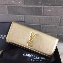 Load image into Gallery viewer, Yves Saint Laurent Golden Classic Metallic Monogramme Clutch
