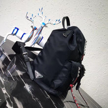 Load image into Gallery viewer, Prada Black Nylon Backpack With Red Metal Studs
