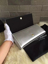 Load image into Gallery viewer, Yves Saint Laurent Silver Classic Metallic Monogramme Clutch
