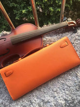 Load image into Gallery viewer, Hermes Orange Handcrafted Kelly Cut Clutch
