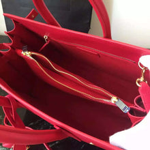 Load image into Gallery viewer, Yves Saint Laurent Small Sac De Jour Bag In Red Leather

