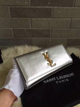 Load image into Gallery viewer, Yves Saint Laurent Silver Classic Metallic Monogramme Clutch
