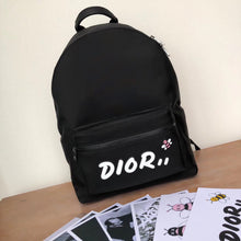 Load image into Gallery viewer, Dior X Kaws Black Nylon Backpack With White Dior logo
