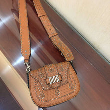 Load image into Gallery viewer, Dior D-Fence Saddle Bag In Brown Studded Calfskin
