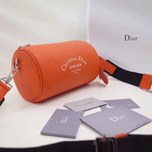 Load image into Gallery viewer, Dior Roller Pouch In Orange Grained Calfskin
