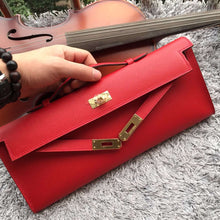 Load image into Gallery viewer, Hermes Red Handcrafted Kelly Cut Clutch
